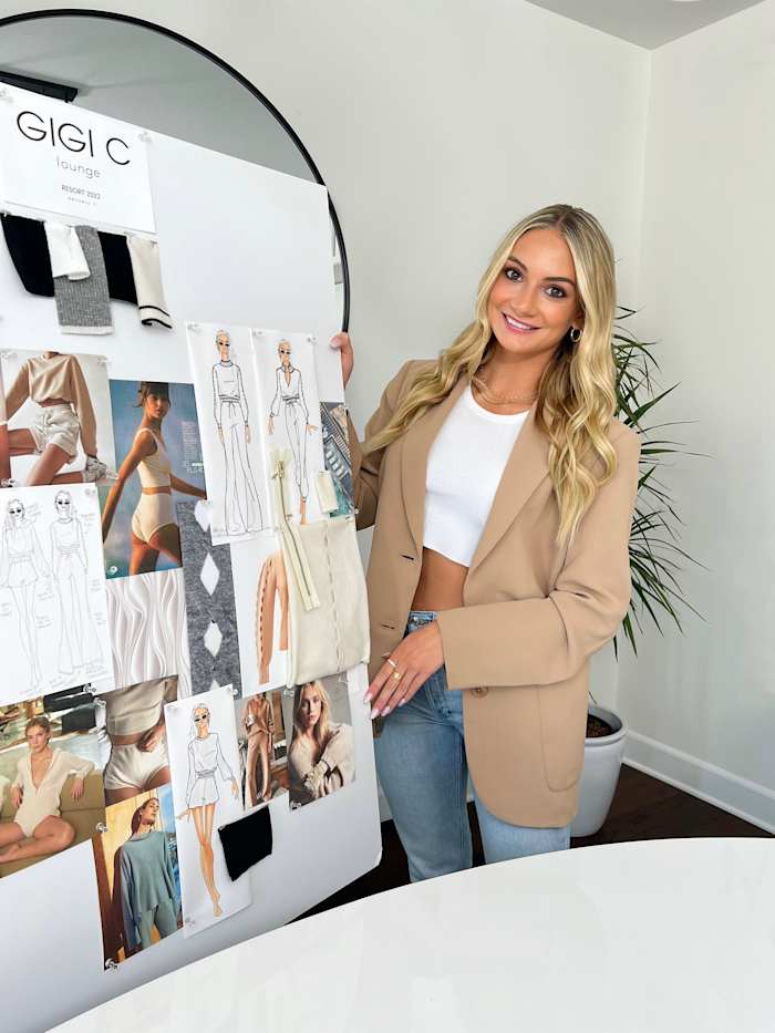 Gigi Caruso with her designs.